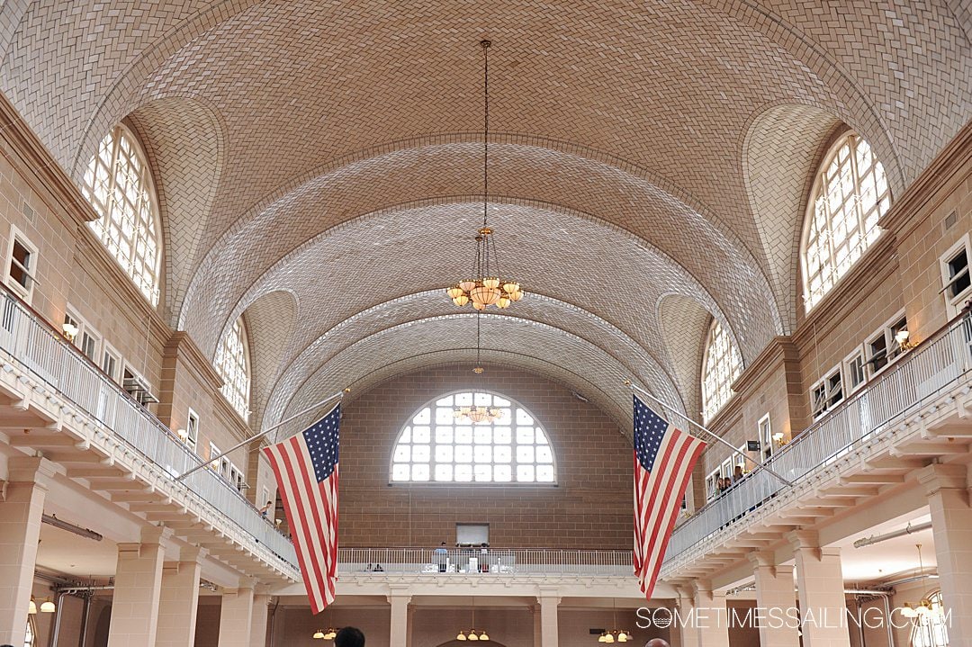 Interior tiled roof with two American flags on either side.