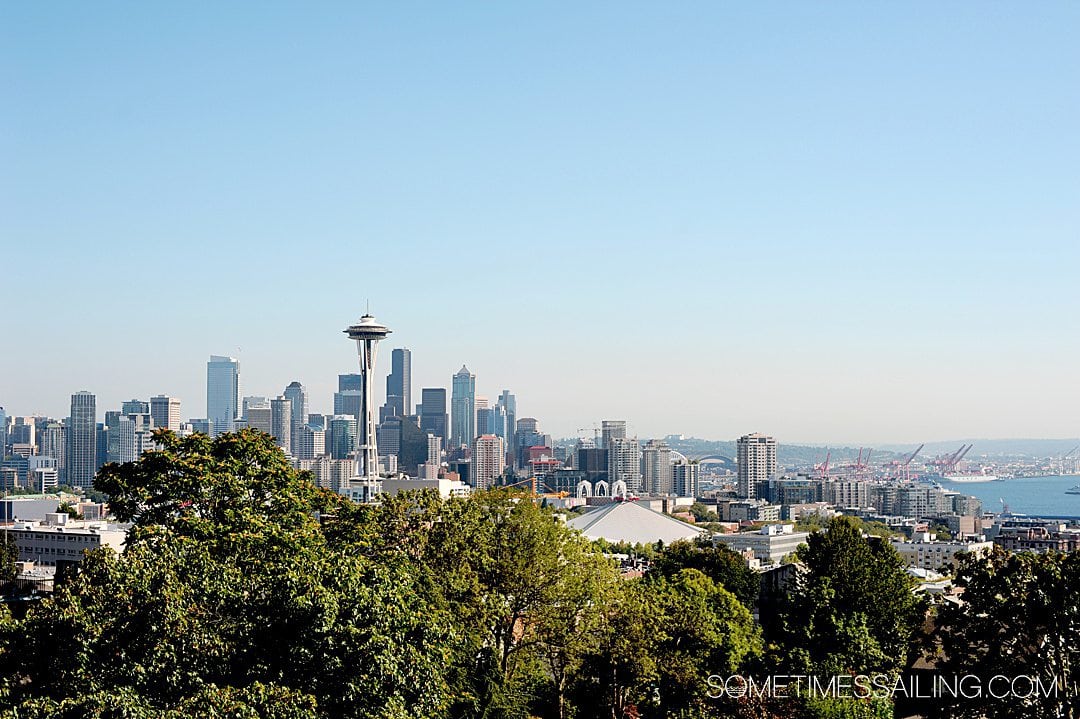 Image of the Seattle Skyline with ships in the harbor in the background.