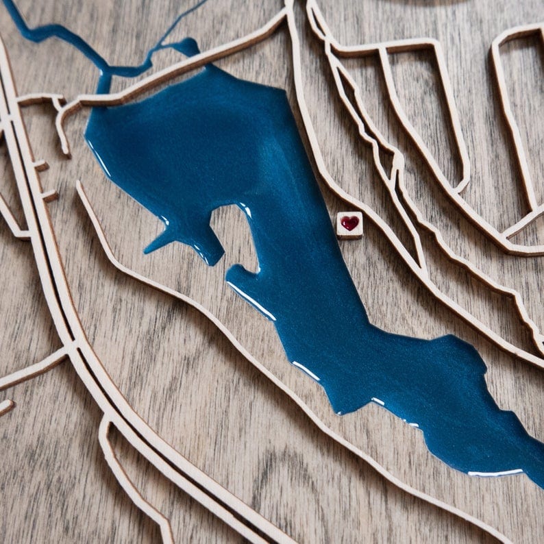 Wood laser carved map and epoxy resin water from DifferentMaps on Etsy.
