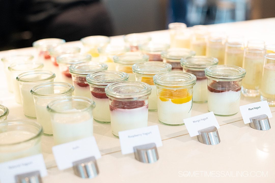 Glass jars of various types of yogurt lined up for breakfast on the Danube River cruise ship, Emerald Destiny.