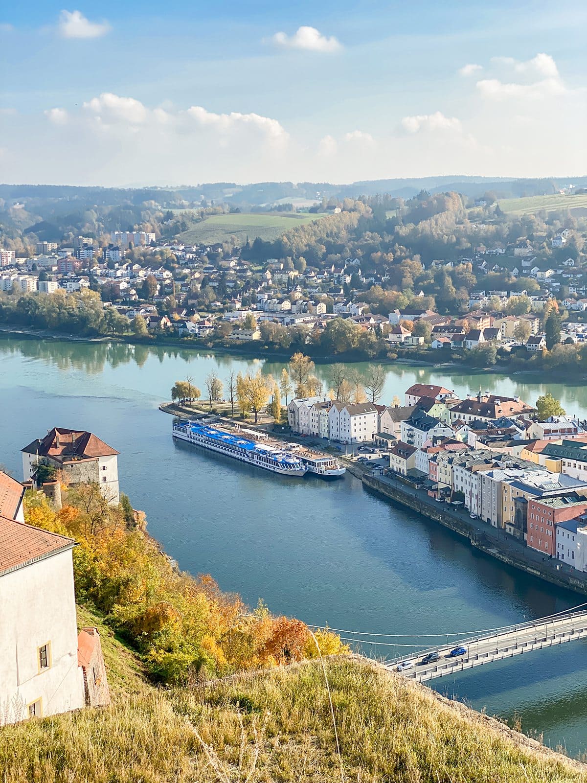 View of Passau, Germany from the top of a fortress looking down on two rivers.