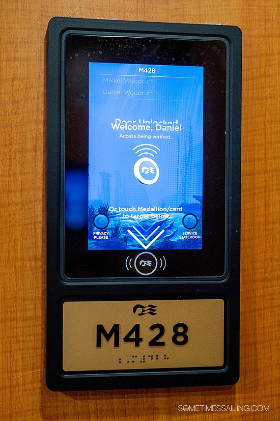 Image of a small screen and door number on Majestic Princess cruise ship showing how Princess Medallion works. 