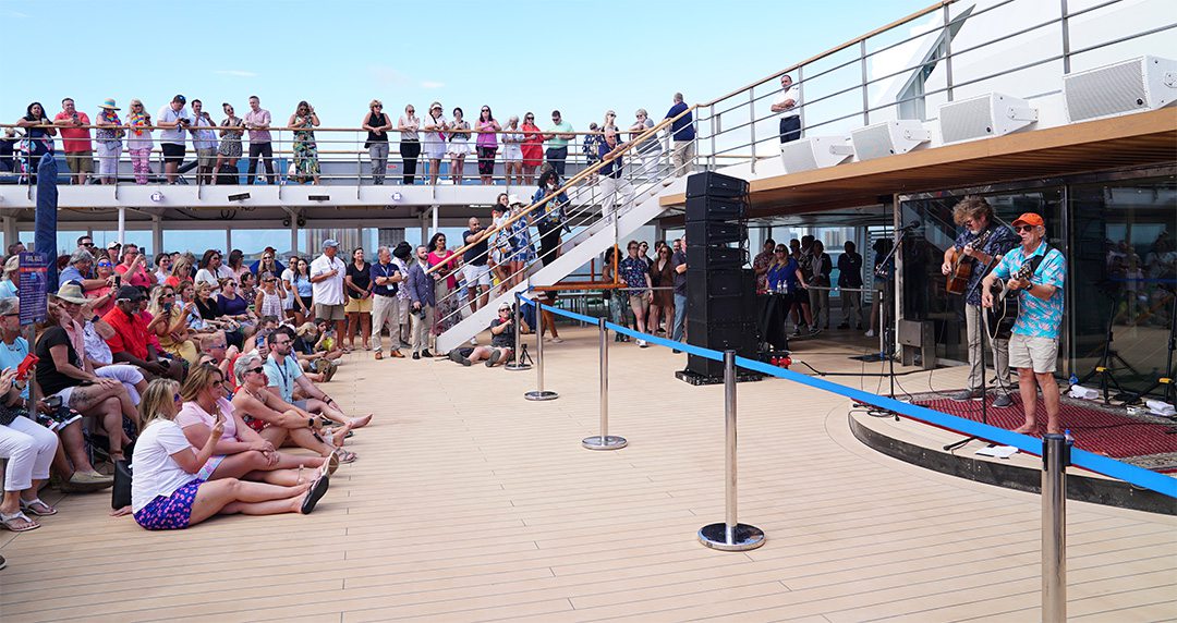 Jimmy Buffett plays guitar onboard Margaritaville at Sea Paradise during its inaugural sailing.