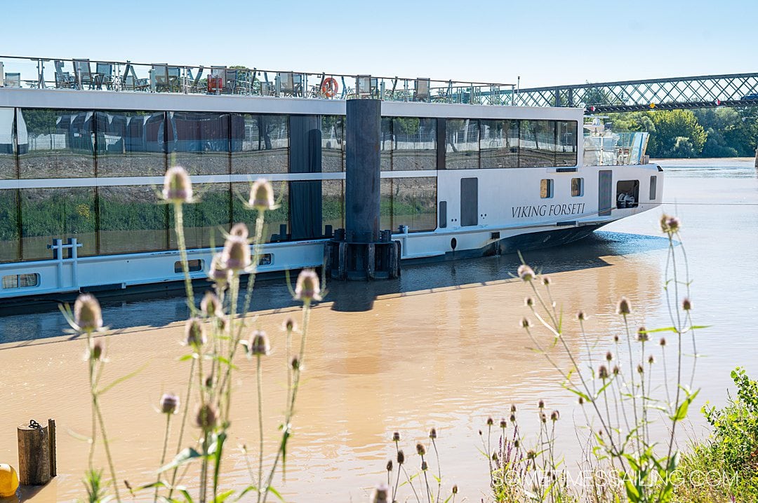 Viking Forseti longship on a river cruise in Bordeaux, docked in a port.