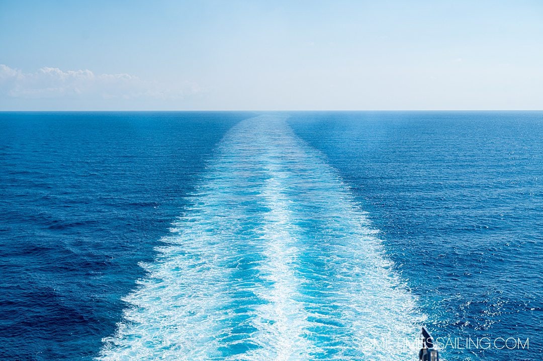 Blue wake in tropical water in the Caribbean off Celebrity Apex.