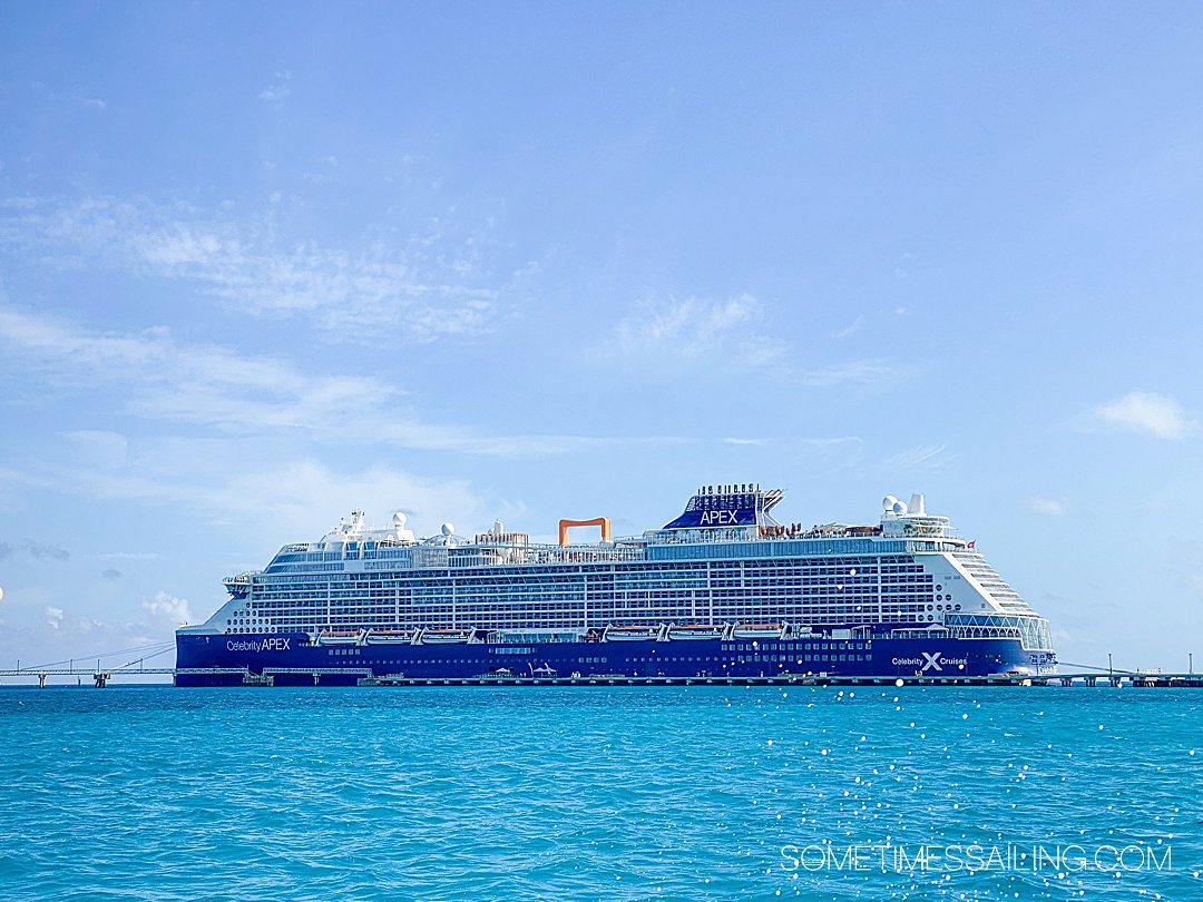 Celebrity Apex cruise ship in Caribbean blue water.