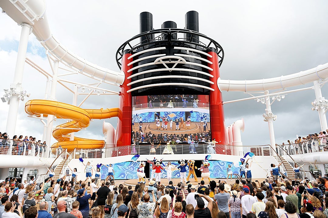 Disney Cruise Line sail away party on the top deck of a cruise ship.