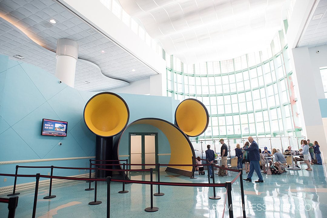 Inside Disney Cruise Line's terminal at Port Canaveral, with an entrance shaped like a Mickey silhouette.