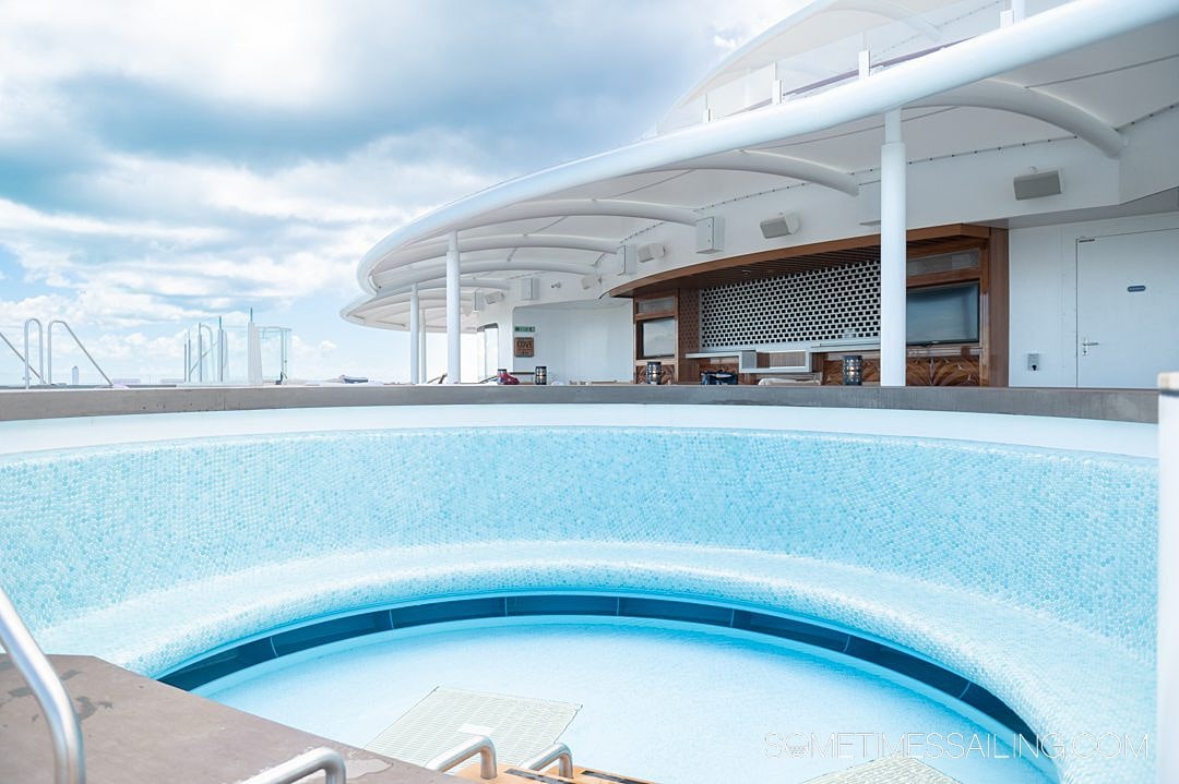 Disney Wish cruise ship's adult-only pool with a bench and shallow water.