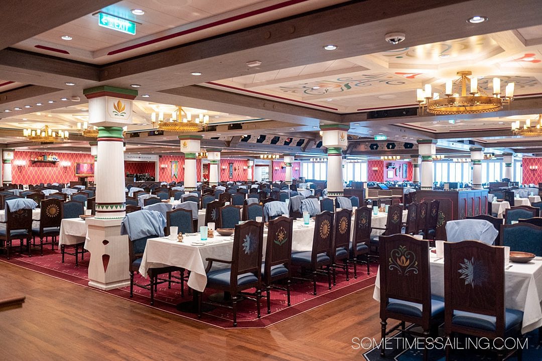 Arendelle restaurant with dark wood details in a "Norwegian" inspired design on Disney Wish cruise ship.