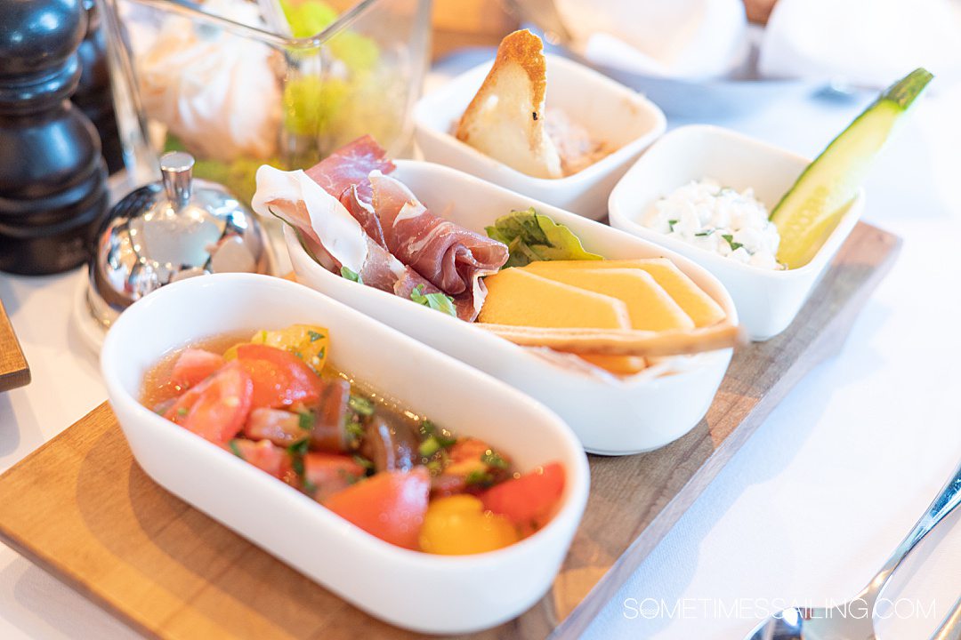 Plates of salads, cheeses, fruit, meat and spreads on an AmaWaterways river cruise.