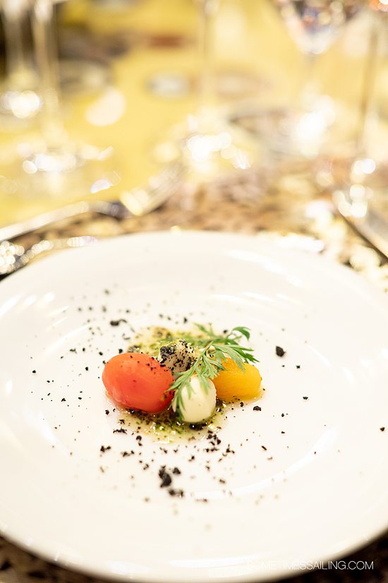 Appetizer of cherry tomatoes and black salt during the Chef's Table dinner on AmaWaterways.