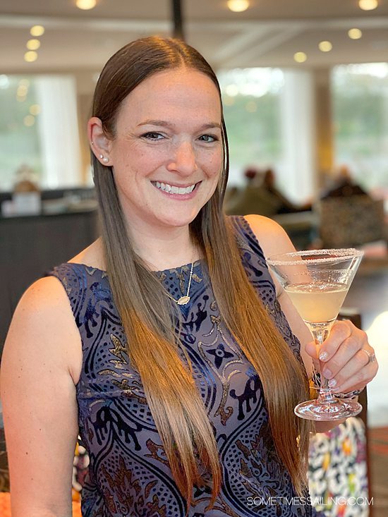 Woman holding a cocktail on an AmaWaterways river cruise during a Sip and Sail reception.