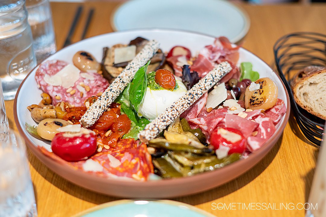 Charcuterie plate with meat, vegetables, cheese and breadsticks at The Renaissance Hotel's Gina restaurant in Bordeaux.