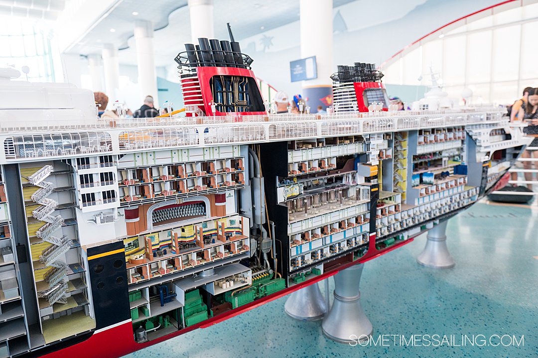 Disney Cruise Line embarkation day terminal in Port Canaveral, with a model of the ship.