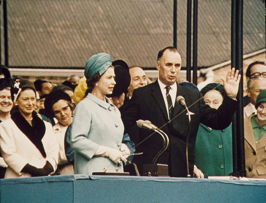 Her Majesty Queen Elizabeth II in 1967, in a blue outfit helping name a new Cunard ship, Queen Elizabeth 2.