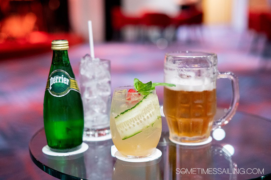 Beverages and glasses on a table for a Celestyal Cruises review, including drinks packages.