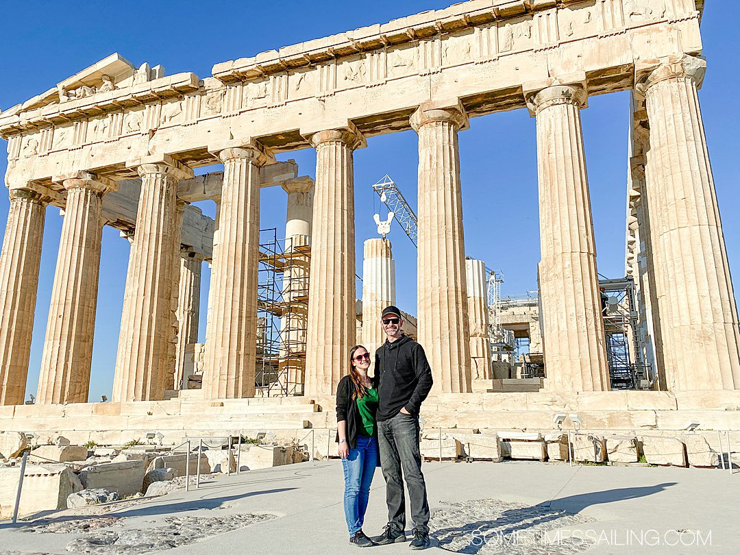 Couple in front of the Greek Acropolis in Athens.