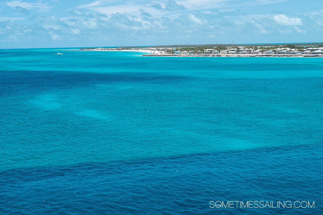 Turquoise ocean with an island in the distance, seen during a Southern Caribbean cruise.