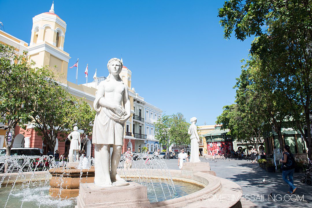 San Juan, Puerto Rico with a white sculpture and fountain in the town square.