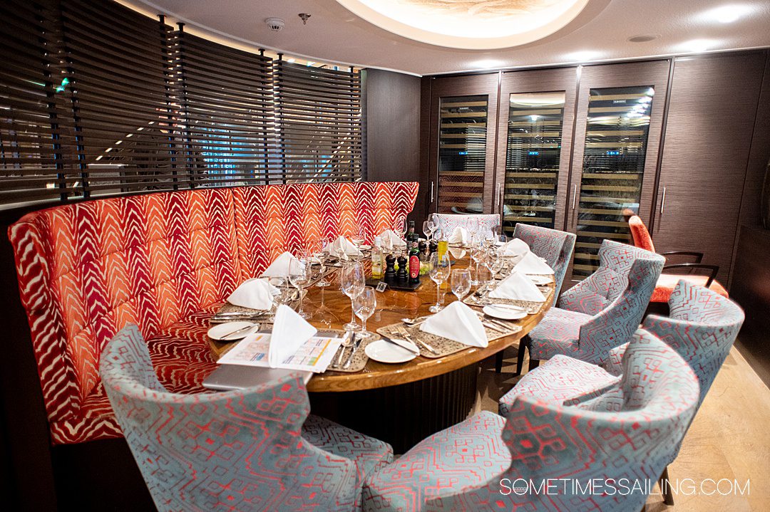 Oval-shaped table with place settings on an AmaWaterways river cruise in France.