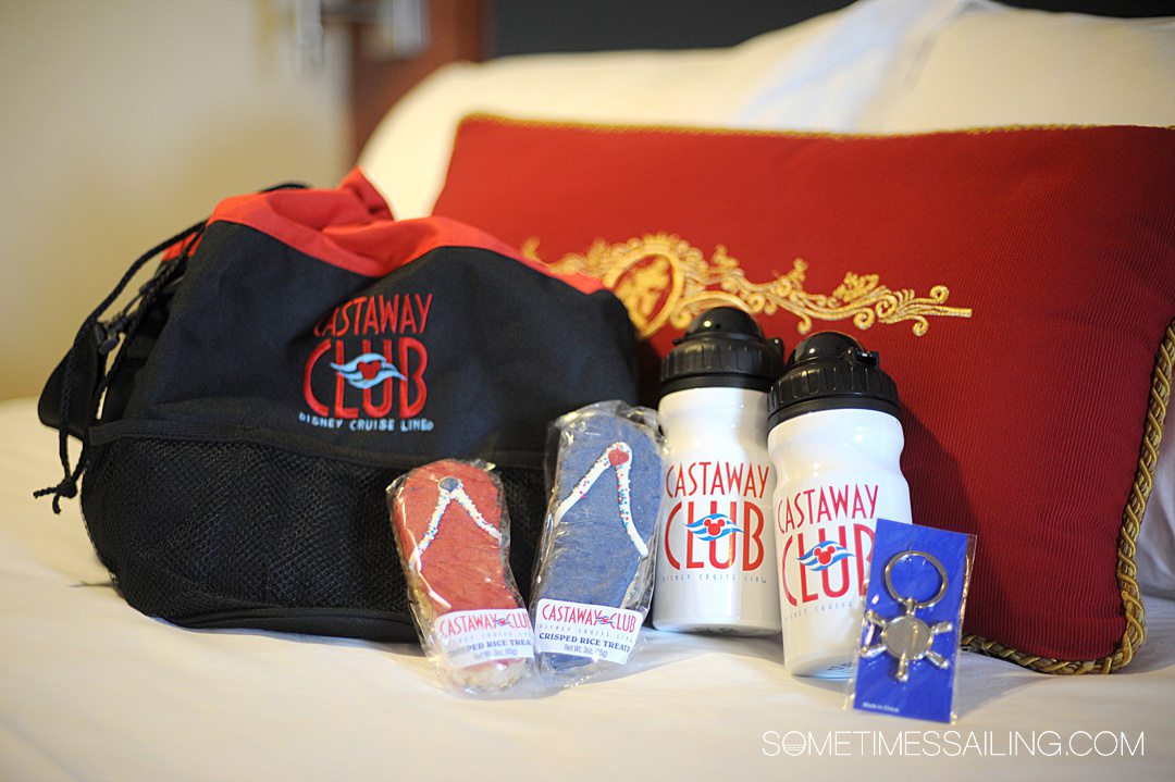 Castaway Club gifts on the bed of a Disney Cruise Line ship.