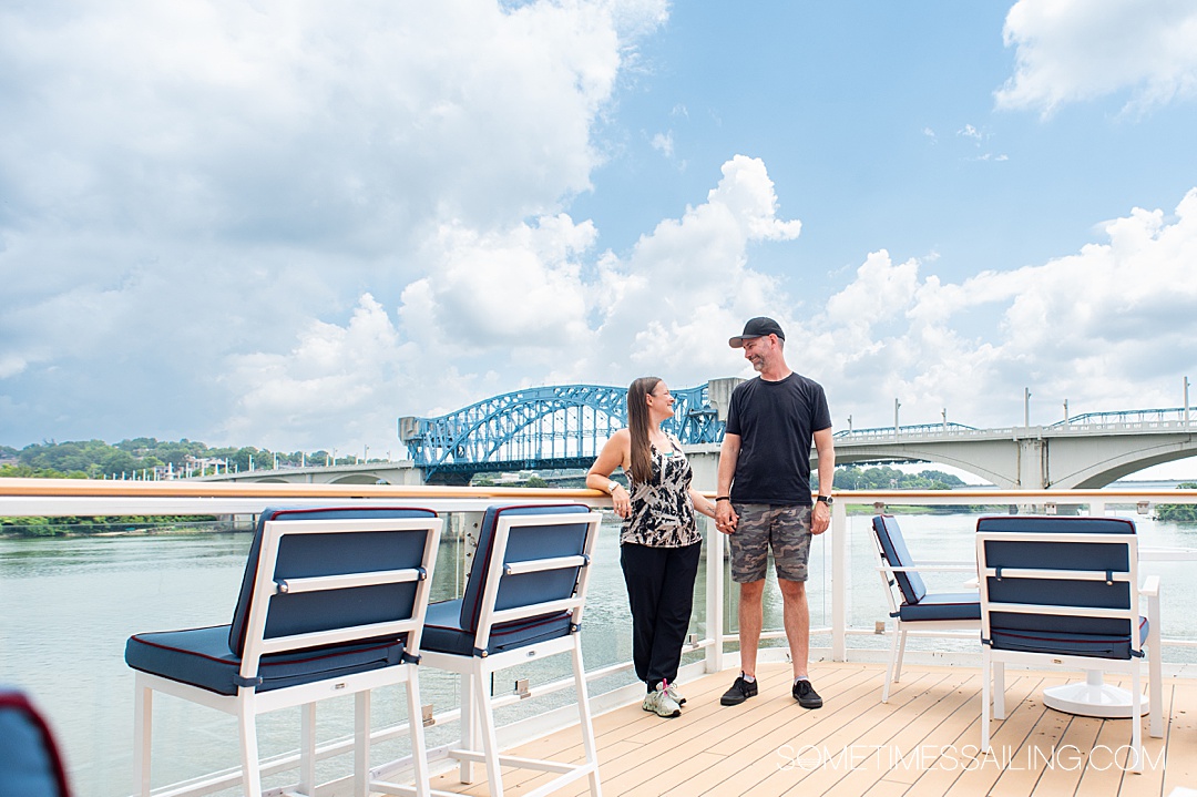 Couple looking at each other on the top deck of the American Serenade river cruise ship on the Tennessee River.