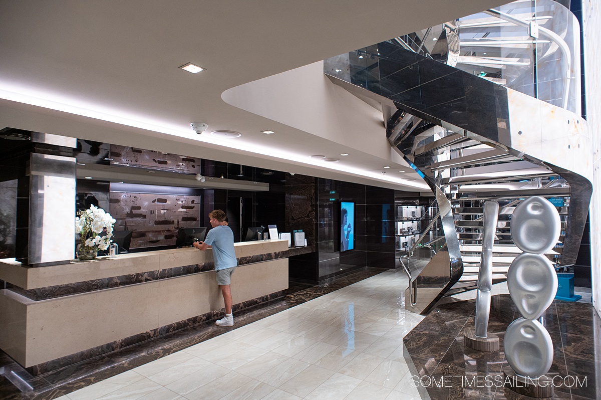 Concierge desk in the suite class area of MSC Yacht Club on a cruise ship.