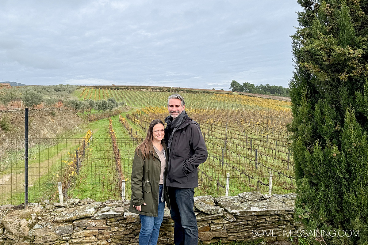 Couple in front of vineyards in the Douro River valley.