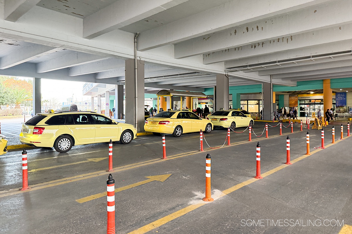 Yellow taxis lined up at the Port of Piraeus, Greece, cruise terminal.