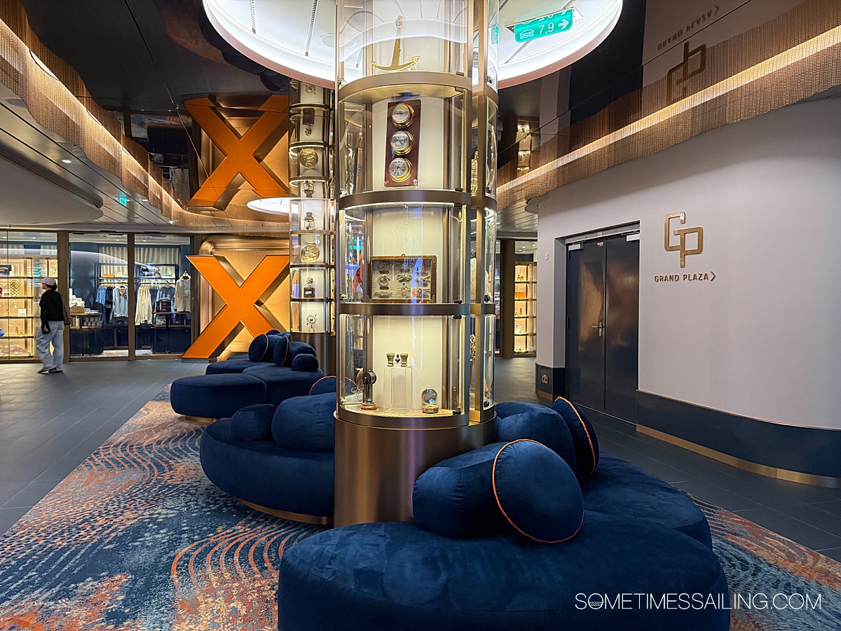 Celebrity Xcel Flagship area blending artifacts and history of the cruise line with a retail space.