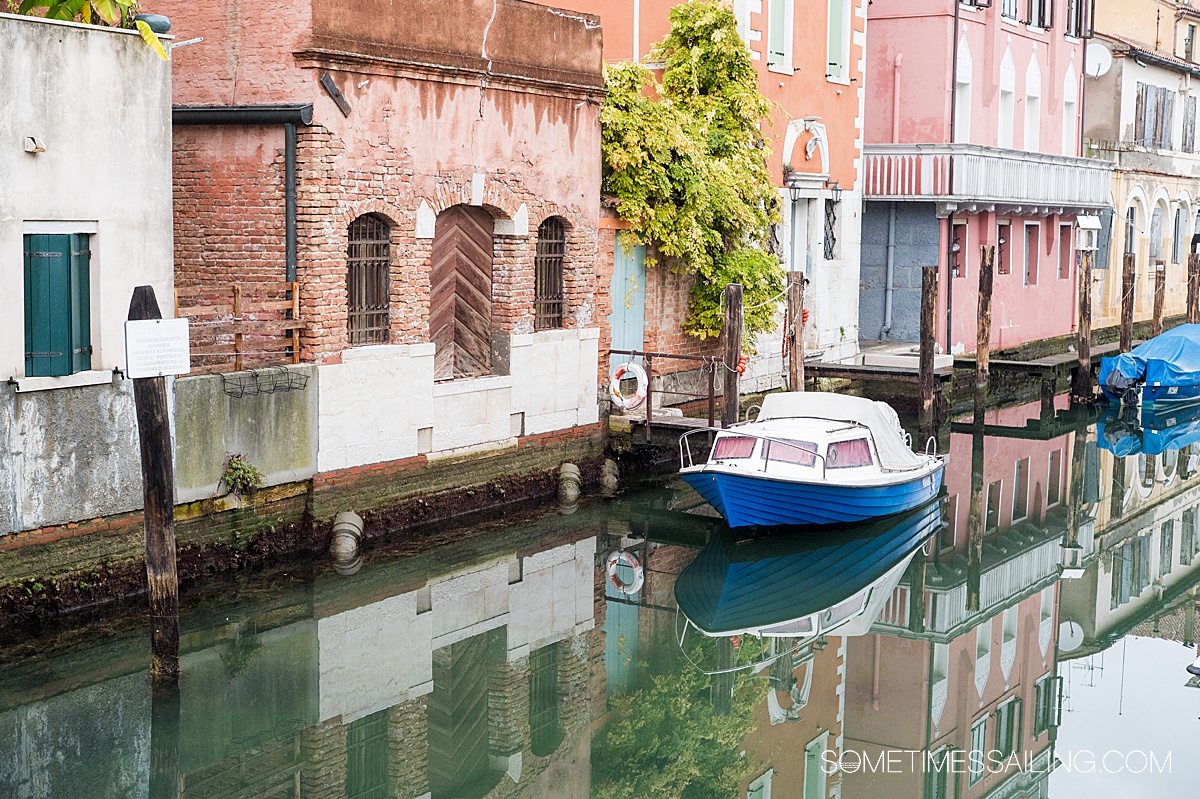 Along the Canal Vena in Chioggia, Italy, with colorful homes and boats.