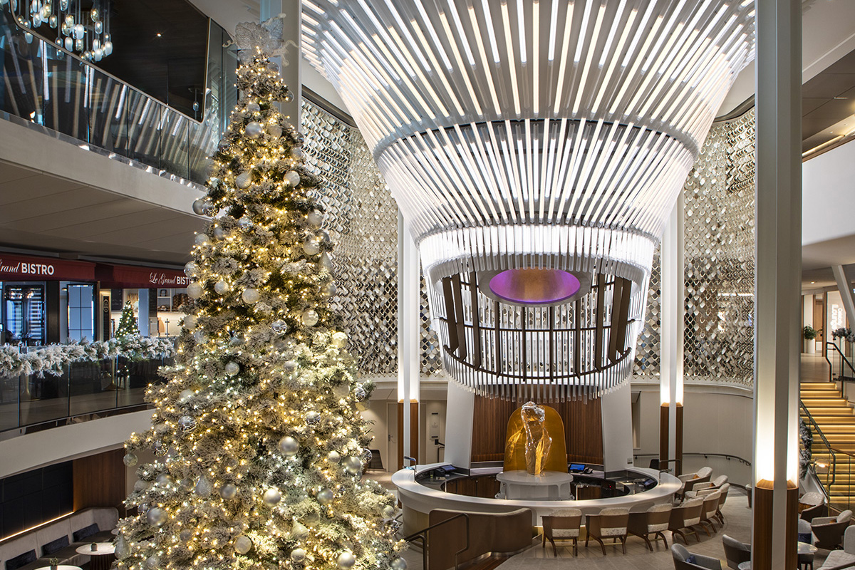 Christmas tree spanning three cruise decks in the Martini Bar area of a Celebrity Cruise Edge class ship.