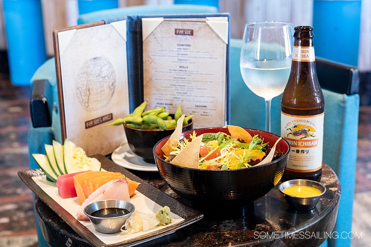 Small table filled with Japanese dishes.