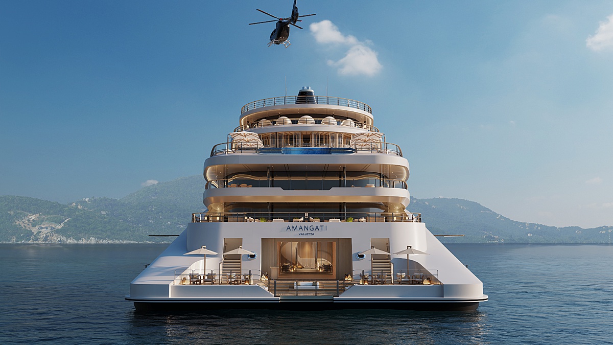 The aft of the Amangati yacht with Aman at Sea with a marina platform and helicopter above.