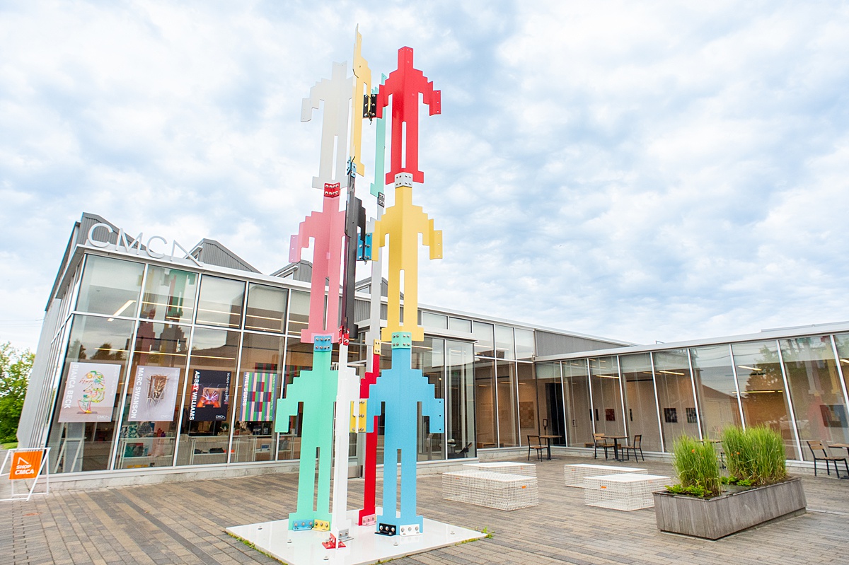 Outside an art museum in Rockland, Maine with a blue sky and colorful sculpture.