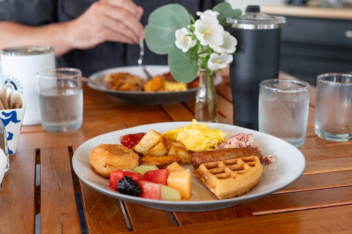 Breakfast plate with an assortment of sweet and savory items.