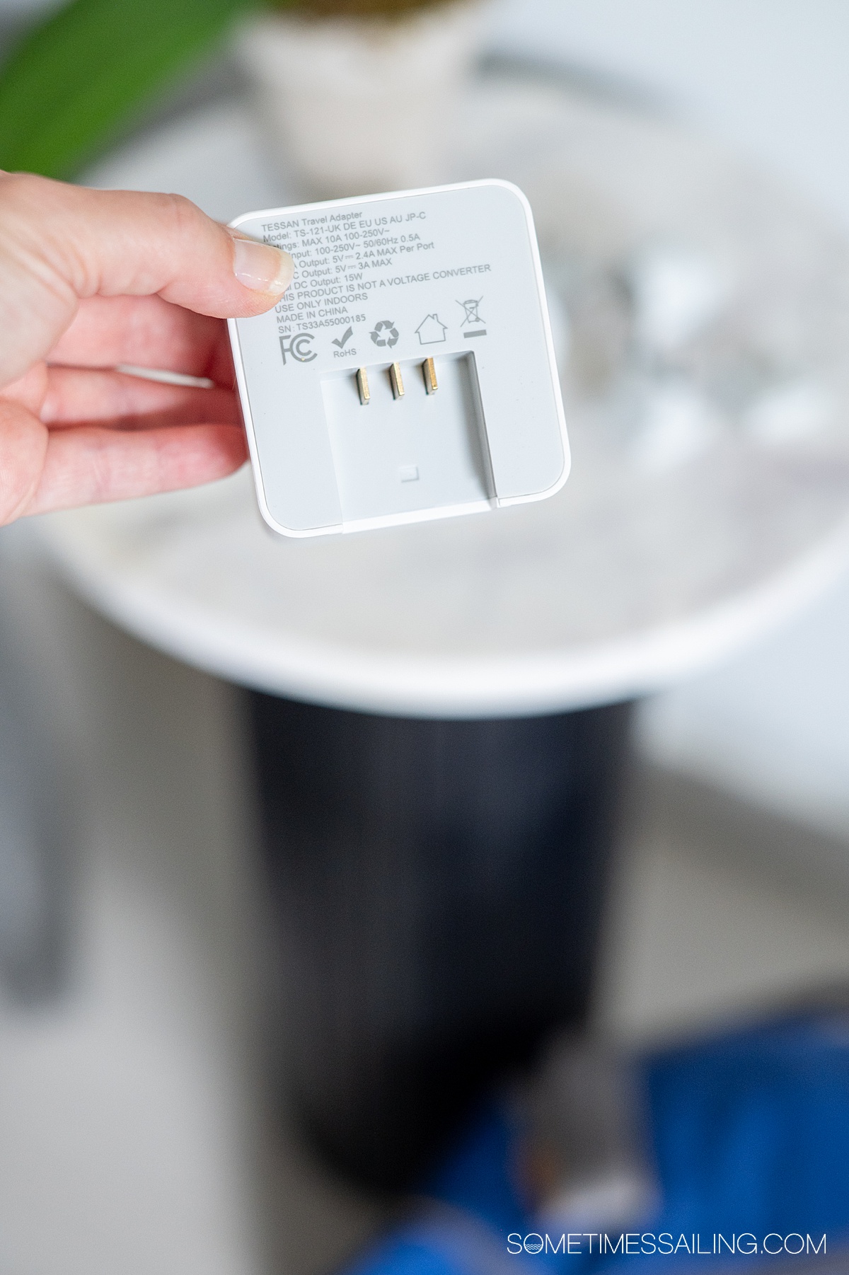 Back side of a travel adapter with changeable parts.